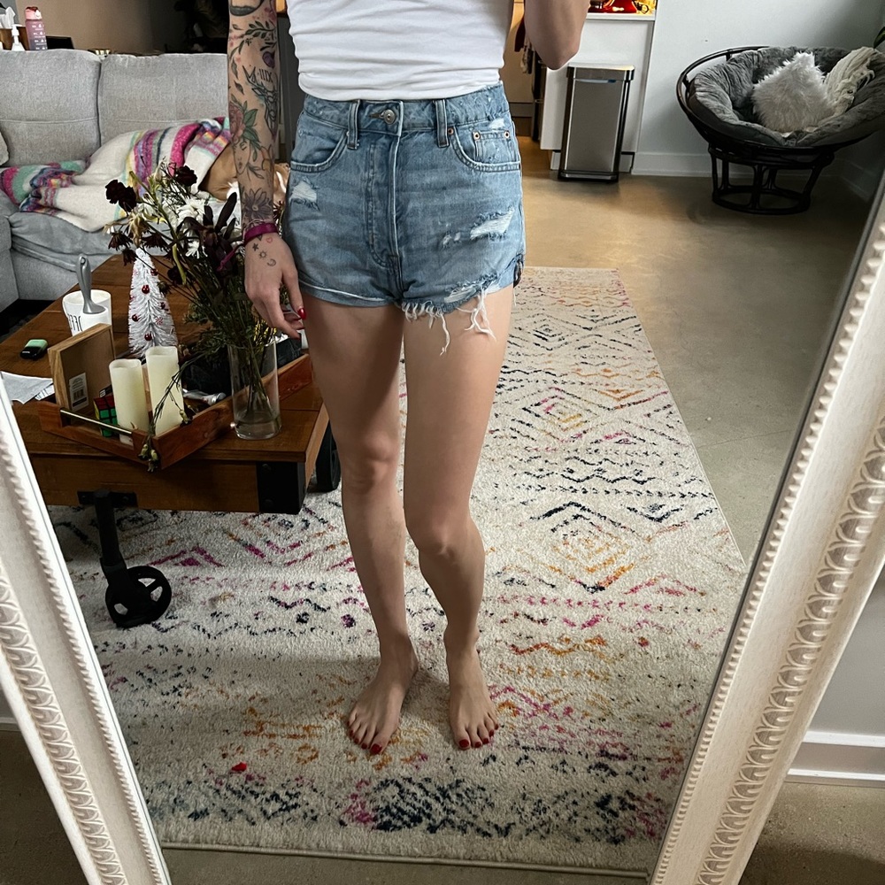 Blue ripped shorts